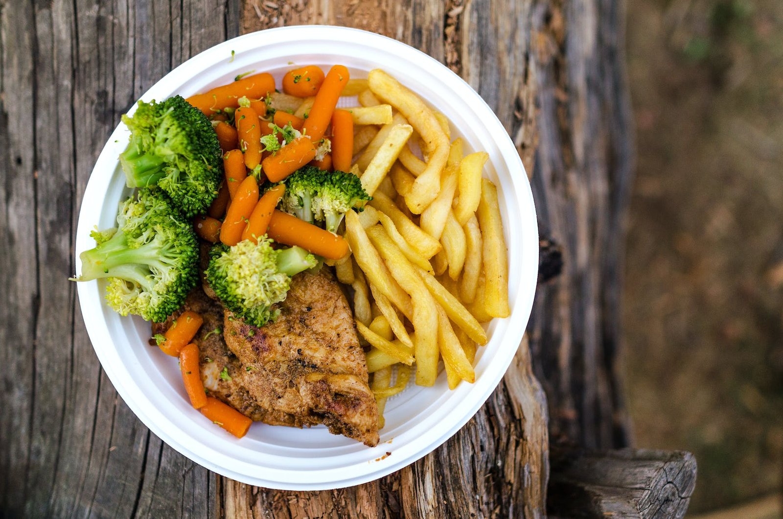 meat broccoli and fries dish